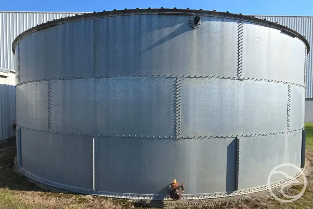 Sectional water tank panels with bolted joints