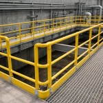 elevated industrial walkway with composite safety handrails